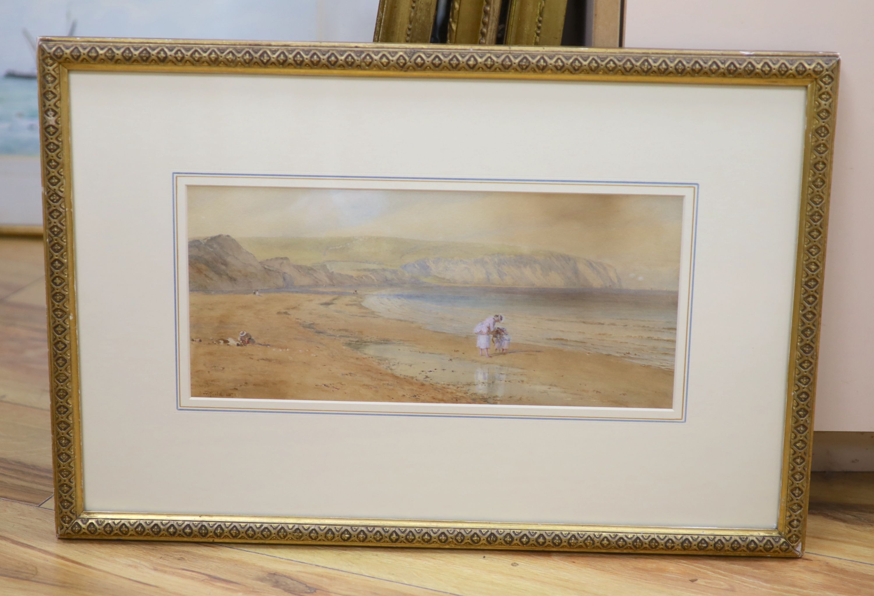 Walter Field, A.R.W.S., (1837-1901), watercolour, 'Mother and children on the beach, Seven Sisters cliffs and coastal scene', signed and dated 1872, 15 x 34.5cm